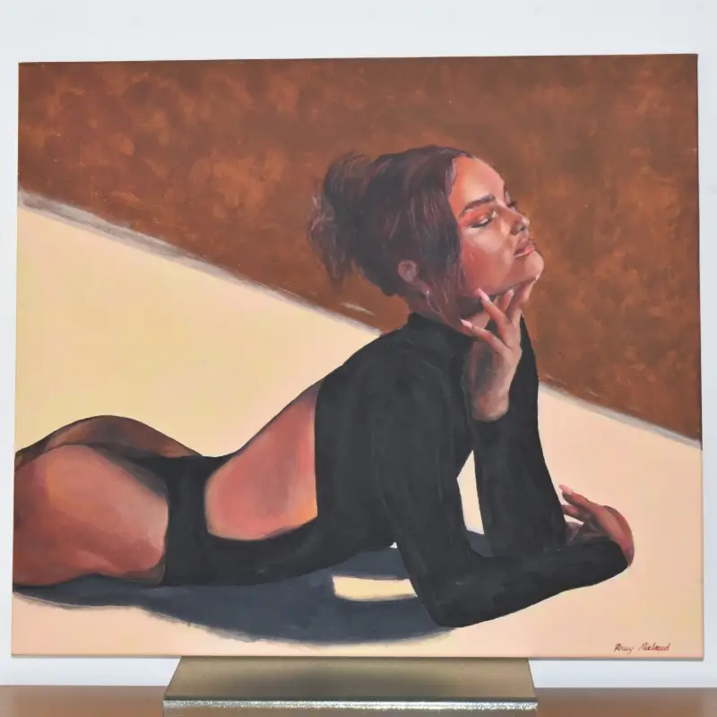 Portrait of woman laying down, with red lighting
